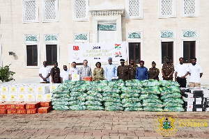 Muntaka Mohammed-Mubarak with Prison Service officials during the ceremony