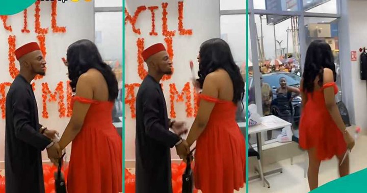 Lady expresses anger as boyfriend proposes to her at eatery