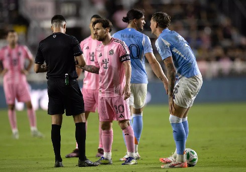 Lionel Messi (middle) fined for grabbing neck of New York City coach 