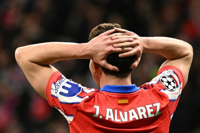 Atletico Madrid's Argentine forward #19 Julian Alvarez reacts during the UEFA Champions League Round of 16 second leg football match between Club Atletico de Madrid and Real Madrid CF at the Metropolitano stadium in Madrid on March 12, 2025. (Photo by JAVIER SORIANO / AFP) (Photo by JAVIER SORIANO/AFP via Getty Images)