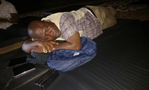 Volta Regional Minister, James Gunu spending the night with displaced persons